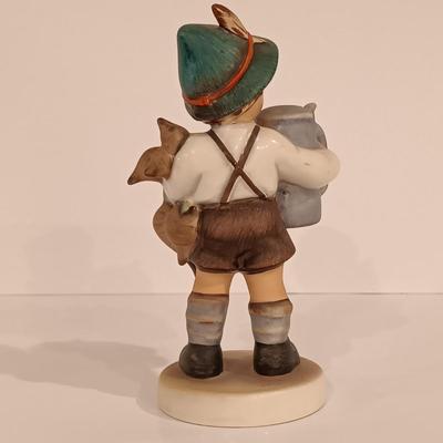 LOT 113: Hummel Goebel Merry Wanderer and For Father Figurines with Hummel Ornament & Painted Wood Die Cuts