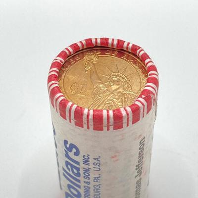 LOT 136: Collection of US President One Dollar $1.00 Loose Coins with $25 Uncirculated Roll of Thomas Jefferson Dollars in Cigar Box
