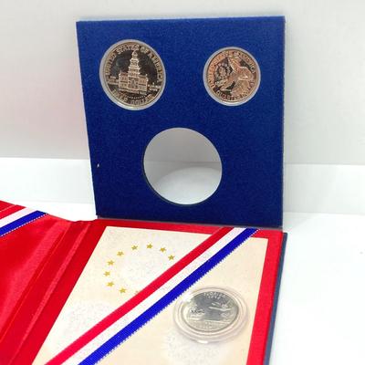 LOT 137: Coin Collection - 1965 Set, Bicentennial Silver Proof Kennedy Half Dollar / Quarter, 1972 Treasury Set, 1975 Proof Set, 1977...