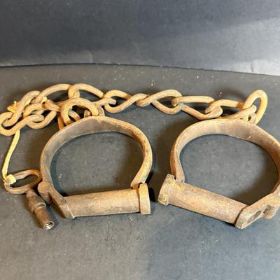 LOT 175: Antique Iron Prison Shackles with key