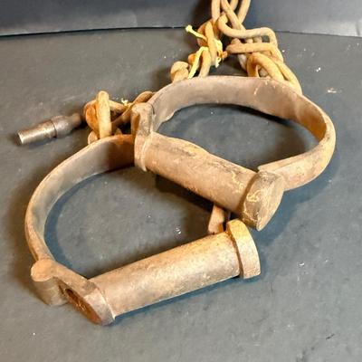 LOT 175: Antique Iron Prison Shackles with key