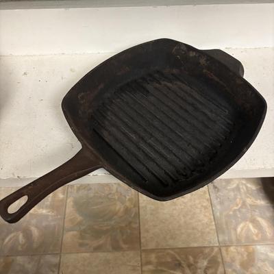 LOT 209: Cast Iron Griddles: Calphalon, Wagners