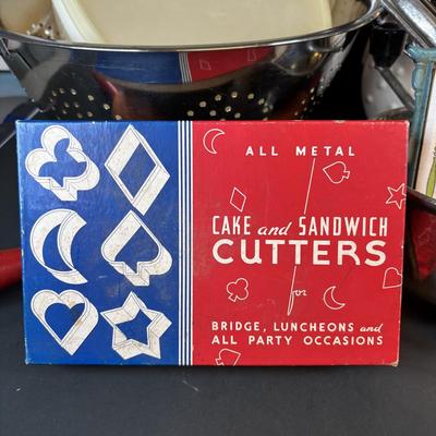 LOT 212: Vintage Kitchen & More: Tupperware Ham Saver, McCoy Hobnail Cookie Jar, Sandwich/Cookie Cutters, Rolling Pin & More