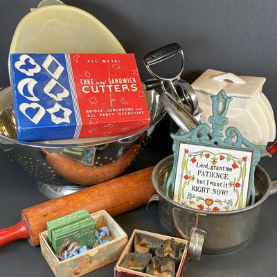 LOT 212: Vintage Kitchen & More: Tupperware Ham Saver, McCoy Hobnail Cookie Jar, Sandwich/Cookie Cutters, Rolling Pin & More