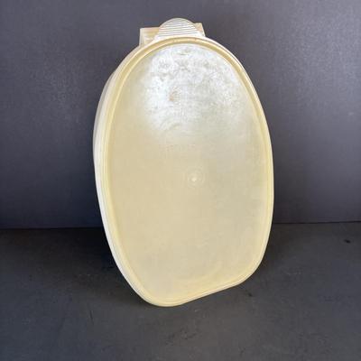 LOT 212: Vintage Kitchen & More: Tupperware Ham Saver, McCoy Hobnail Cookie Jar, Sandwich/Cookie Cutters, Rolling Pin & More
