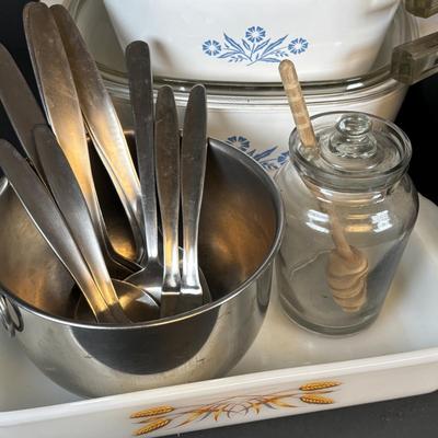 LOT 213: Kitchen Essentials: Corelle, Corning Ware, Fire King, Glass Double Boiler, Flatware and a Glass Honeypot