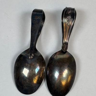 LOT 223: Lovely Vintage Collection of What Nots: St. Peter Nacht Lichte, Germany Floating Candles, Baby Spoons, Crumb Sweeper, Clothing...
