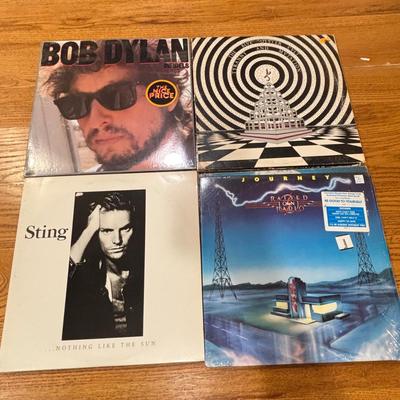 LOT 228: Classic Vinyl LPS: Sealed Nirvana Unplugged & Live, Journey, Warren Zevon, Joe Cocker, Blue Oyster Cult, Bob Dylann & More
