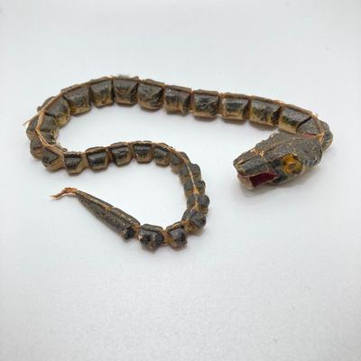 LOT 186: Vintage Sporting Goods Collection - Cast Iron Reindeer / Buck Figurine Made in Germany, Articulated Snake, Fishing Charts,...