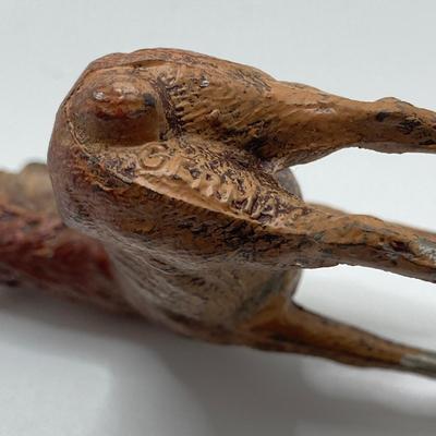 LOT 186: Vintage Sporting Goods Collection - Cast Iron Reindeer / Buck Figurine Made in Germany, Articulated Snake, Fishing Charts,...