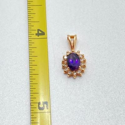 LOT 501: T&C Gold Ameythst Pendant - 14KP, TW 0.9g