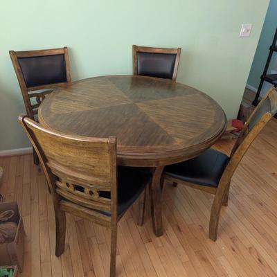 Round Dining Room Table With 4 Chairs with a Bottom Stretcher Shelf