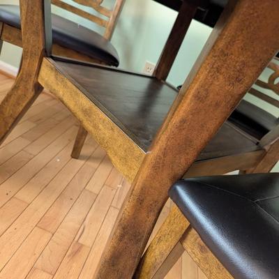 Round Dining Room Table With 4 Chairs with a Bottom Stretcher Shelf
