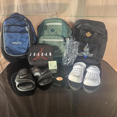 BACKPACKS, WATER BOTTLE, CROCS, NIKE FLIP FLOPS & AIR JORDAN BAG