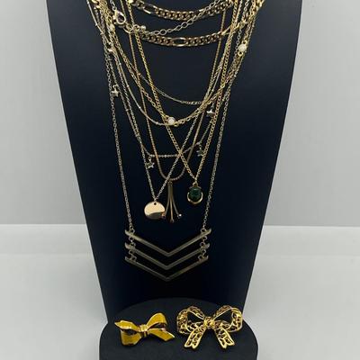 LOT 169J: Assorted Goldtone Necklaces PLUS Two Bow Pins: Avon and More!