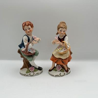 Napcoware Vintage Girl and Boy On Tree Stumps Figurines