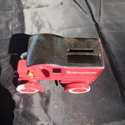 2 METAL COIN BANKS (1 HAS KEY)