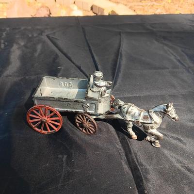 CAST IRON HORSE DRAWN WAGON AND AN OLD METAL COIN BANK (NO KEY)