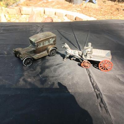 CAST IRON HORSE DRAWN WAGON AND AN OLD METAL COIN BANK (NO KEY)