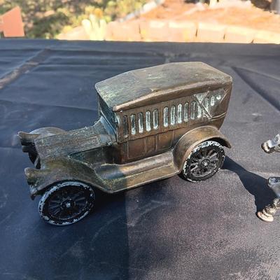 CAST IRON HORSE DRAWN WAGON AND AN OLD METAL COIN BANK (NO KEY)