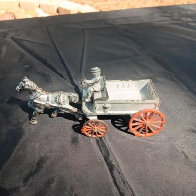 CAST IRON HORSE DRAWN WAGON AND AN OLD METAL COIN BANK (NO KEY)