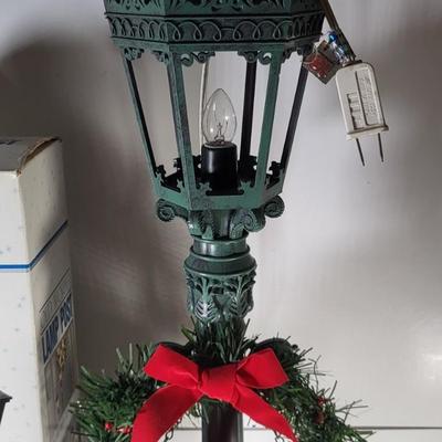 LOT 176G: Two Christmas Lamp Post Decorations with Christmas Bells