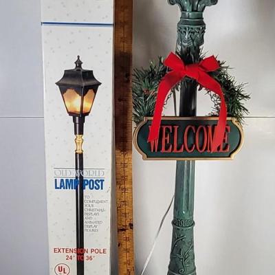 LOT 176G: Two Christmas Lamp Post Decorations with Christmas Bells