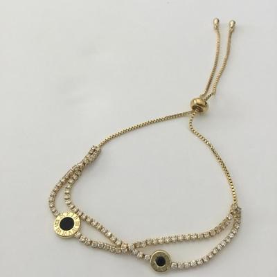 Super cute gold tone crystal rhinestone slider bracelet