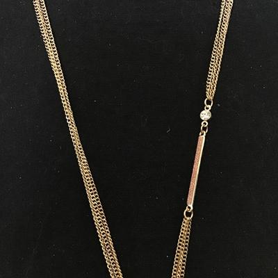 Beautiful gold tone, rhinestone sparkly tassel necklace