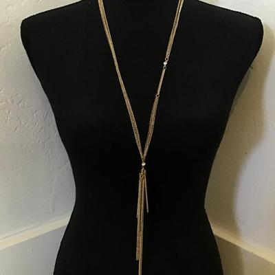 Beautiful gold tone, rhinestone sparkly tassel necklace