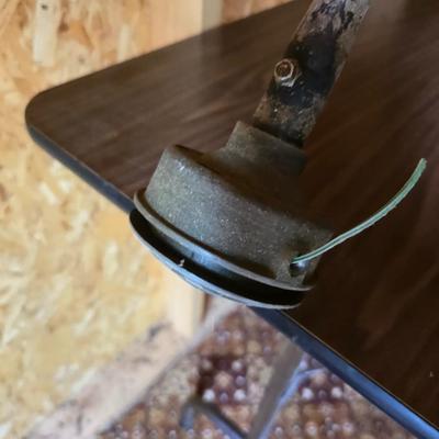 26cs Homelite weeder with extra string and 1 1/4 gas can