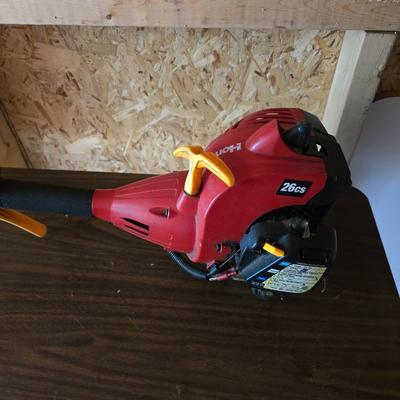 26cs Homelite weeder with extra string and 1 1/4 gas can