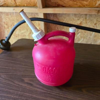 26cs Homelite weeder with extra string and 1 1/4 gas can