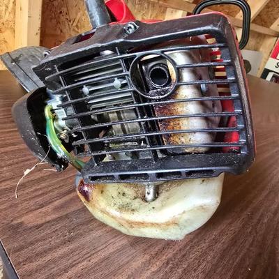 26cs Homelite weeder with extra string and 1 1/4 gas can