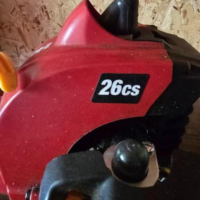 26cs Homelite weeder with extra string and 1 1/4 gas can