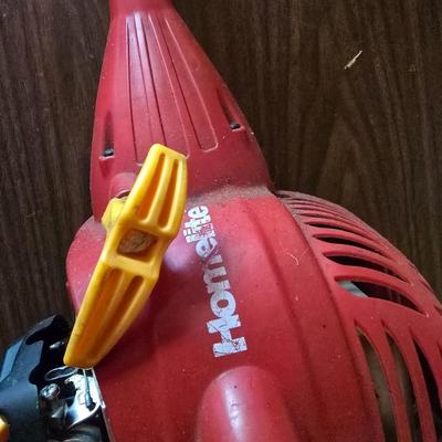 26cs Homelite weeder with extra string and 1 1/4 gas can