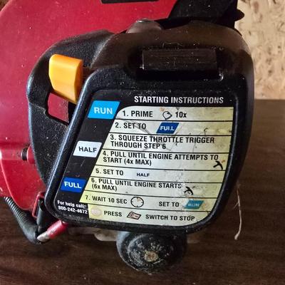 26cs Homelite weeder with extra string and 1 1/4 gas can