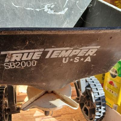 Lawn and Garden supplies and chemicals with a true temper spreader