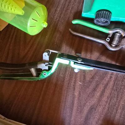 Yard / garden sprinklers and handtools with a bunch of vegetable seeds (some past the date)