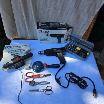 An Assortment of drills and tools, some newer, some vintage