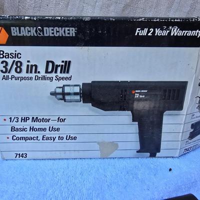 An Assortment of drills and tools, some newer, some vintage