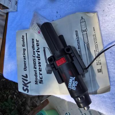 An Assortment of drills and tools, some newer, some vintage