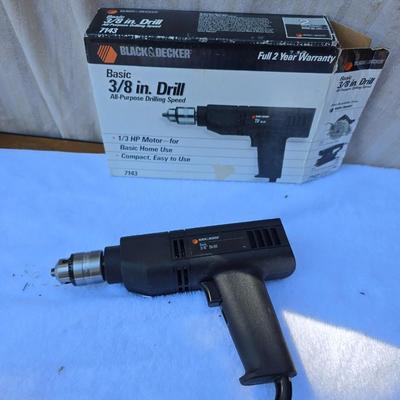 An Assortment of drills and tools, some newer, some vintage