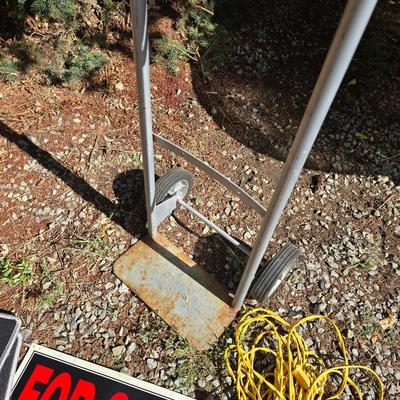 Two wheeled dolly - rope - For Sale sign - automotive fluid - snow /ice scraper and a pair of floor mats