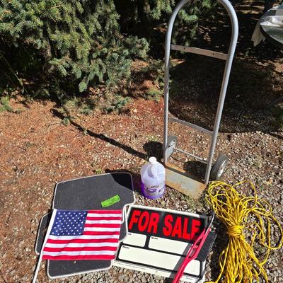 Two wheeled dolly - rope - For Sale sign - automotive fluid - snow /ice scraper and a pair of floor mats