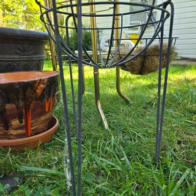 Flowerpots and Sprinklers with a brass plant stand