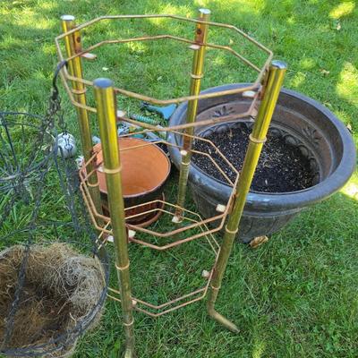 Flowerpots and Sprinklers with a brass plant stand
