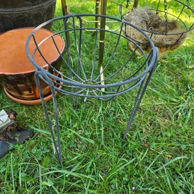 Flowerpots and Sprinklers with a brass plant stand