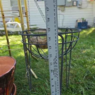 Flowerpots and Sprinklers with a brass plant stand