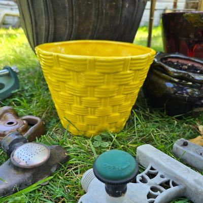 Flowerpots and Sprinklers with a brass plant stand